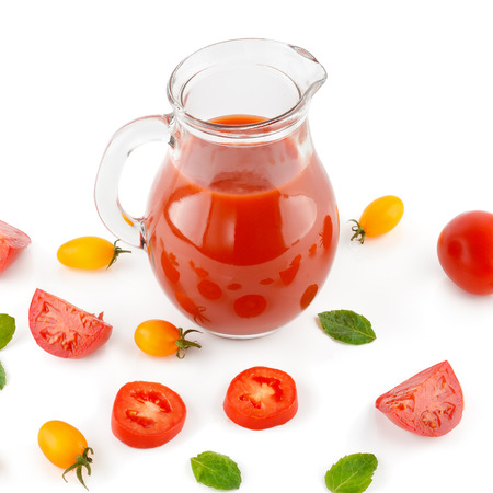 Fresh tomato juice and tomatoes isolated on white background. Flat lay,top view.の写真素材