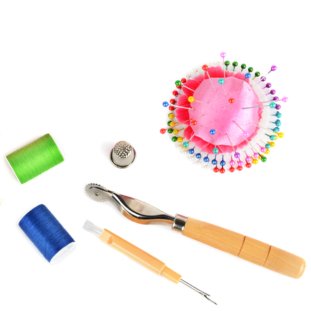 Composition with threads and sewing accessories isolated on white background. Sewing pattern. Flat lay, top view.の写真素材