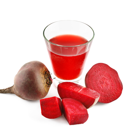 Red beet and fresh juice in a glass isolated on white background.の写真素材
