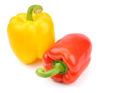 Yellow and red sweet pepper isolated on white background. Free space for text.の写真素材