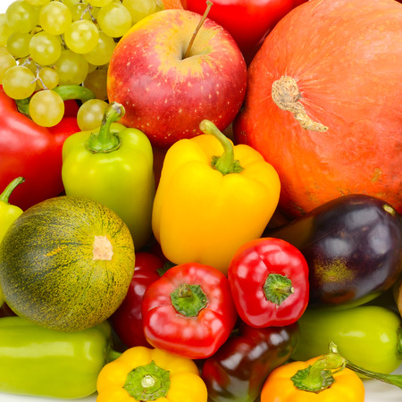 A set of fresh vegetables and fruits. Bright beautiful background.の写真素材