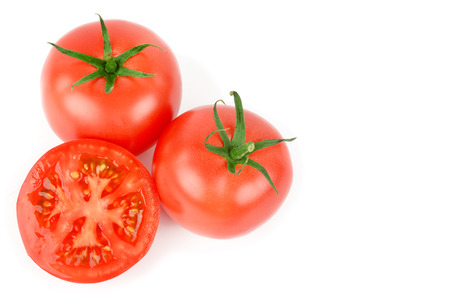 Fresh appetizing tomatoes isolated on white background. Organic healthy food.の写真素材