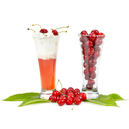 Fresh berries of cherries and smoothies isolated on white background.の写真素材