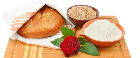 Bread, whole grain and flour isolated on white background. Wide photo.の写真素材