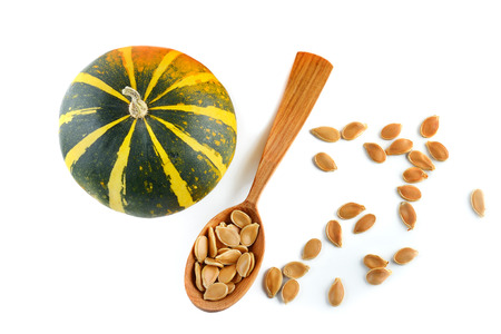 Seeds and pumpkin fruits isolated on white background. Flat lay, top view.の写真素材