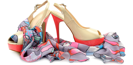Elegant sandals and scarf isolated on white background. Wide photo.の写真素材