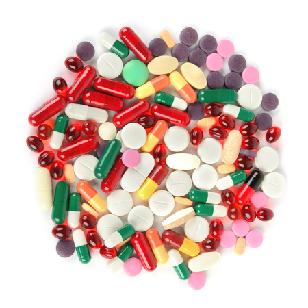 Assorted pharmaceutical medicine pills, tablets and capsules isolated on white background. Flat lay, top view.の写真素材