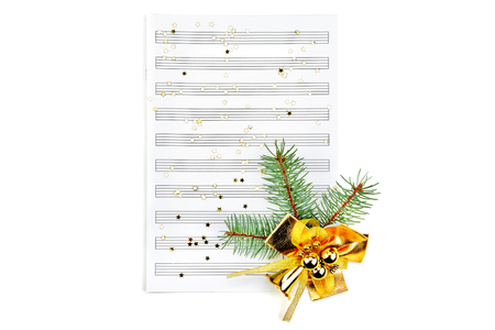 Christmas decorations and music sheet isolated on white backgroundの写真素材