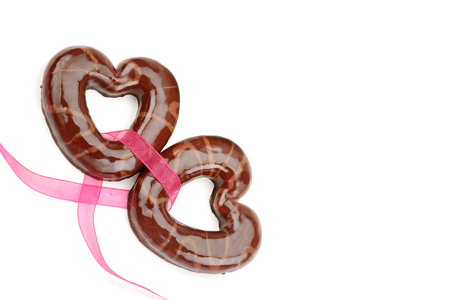 Christmas gingerbread cookies in the form of heartsisolated on the white background. Free space for textの写真素材