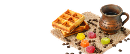 Cup of coffee, waffles and marmalade isolated on white background. Wide photo. Free space for text.の写真素材