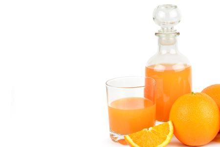 Fresh orange juice with fruits, isolated on white background. Organic food. Free space for text.の写真素材