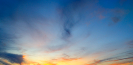 Sun's rays illuminate the sky above the horizon.の写真素材