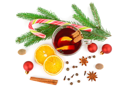 Hot red mulled wine isolated on white  with christmas spicesの写真素材