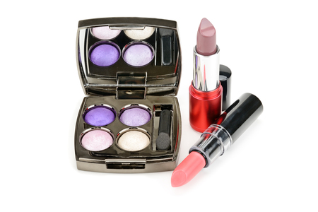 Lipsticks and eye shadow isolated on whiteの写真素材