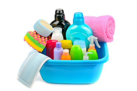 Cotton towels, cosmetic soap, sponge and shampoo isolated on whiteの写真素材