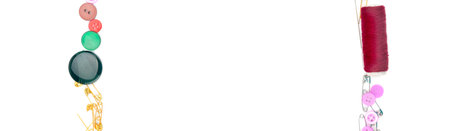 Sewing accessories isolated on white background. Colorful frame of buttons, threads and needles. Free space for text. Wide photo.の写真素材