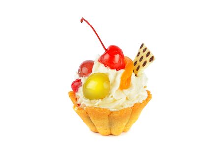 Small cake with cream and fruit isolated on a white background.の写真素材