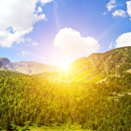 Beautiful sunrise over the mountain range. The concept is travel.の写真素材