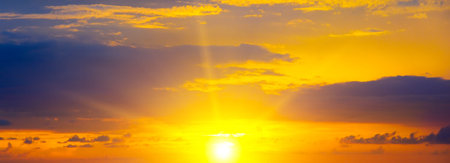 Bright orange sky and sunrise. Wide photo.