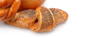 Croissant and buns isolated isolated on white background. Healthy food. Wide photo. Free space for text.の写真素材