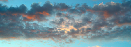 Colorful dramatic sky with cloud at sunset. Wide photo.