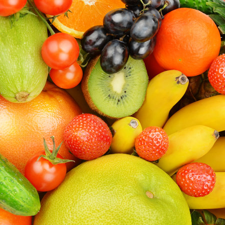 Beautiful bright background from various vegetables and fruits.の写真素材