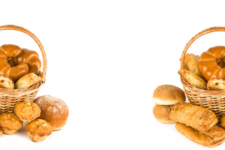Sweet pastries in a basket isolated on a white background. Free space for text.