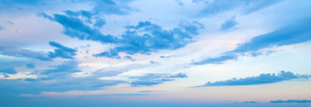 Bright sunrise against the blue sky. wide photo.の写真素材