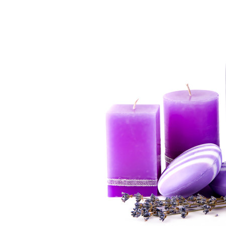 Lavender scented candle and soap isolated on white background. Free space for text.の写真素材