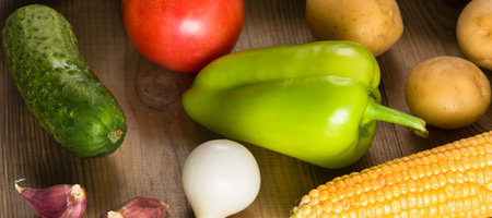 Set of vegetables on a wooden table. Wide photo.の写真素材