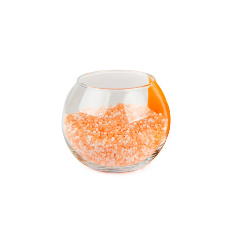 Aromatic bath salt with orange extract isolated on white background.の写真素材