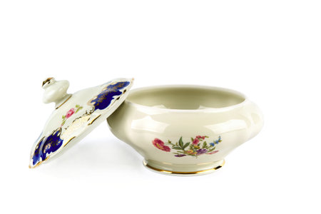 Porcelain box for sweets isolated on a white background. German vintage porcelain, Winterling porcelain manufactory.の写真素材