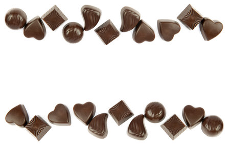 Chocolate candies isolated on white background. There is free space for text. Collage.の写真素材
