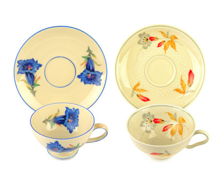 Vintage porcelain cups and saucer isolated on white background. Collage.の写真素材