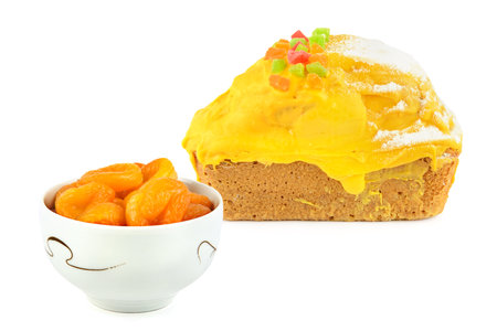 Honey lemon cake with dried apricots isolated on white background. Collage. Free space for text.の写真素材