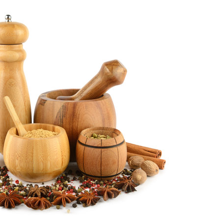 Pepper grinder mill, mortar, pestle and spice set isolated on white background. Free space for text.の写真素材