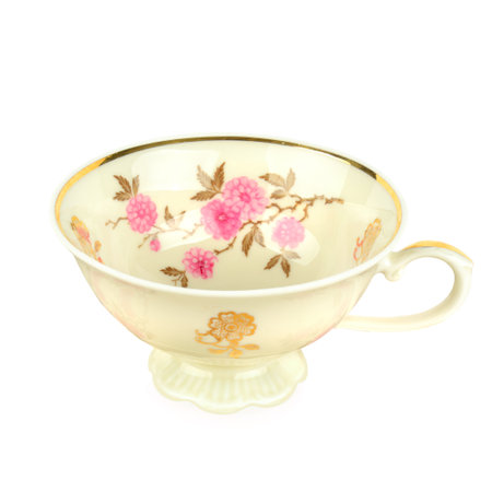 Vintage porcelain cup isolated on white background.の写真素材