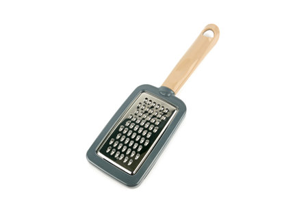 Stainless steel grater isolated on white background, top view. Kitchen utensil