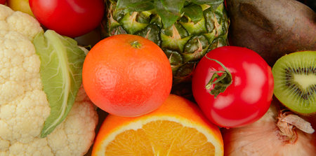 Assorted fresh ripe fruits and vegetables. Food concept background. Wide photo.の写真素材