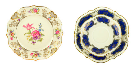 Set of vintage porcelain plates isolated on white background. Collage. Wide photo.の写真素材