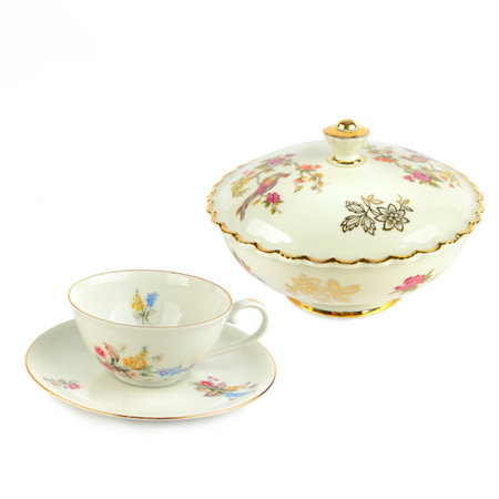 Vintage porcelain bowl, cup and saucer isolated on white background. Collage. Free space for text.の写真素材