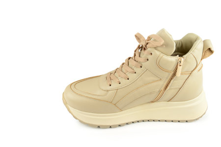 Sneakers. fashionable leather shoes isolated on white background. Free space for text.の写真素材