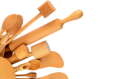 Set of wooden kitchen utensils isolated on white background. Free space for text.の写真素材