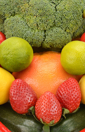 A set of fruits and vegetables. Bright background. Vertical photo.の写真素材