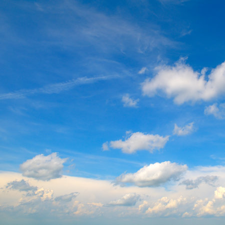 The sky is very bright and the cloudsの写真素材
