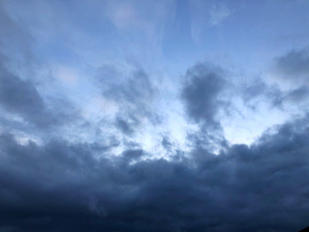 blue sky is covered by blue clouds