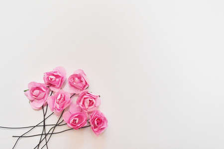 beautiful pink roses on wooden background with space for textの写真素材