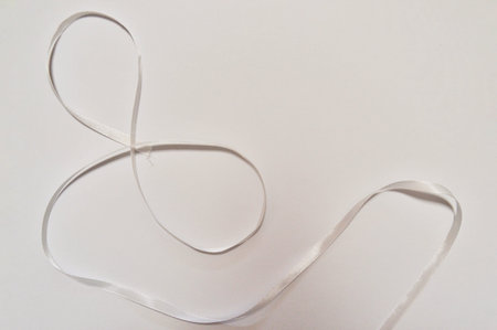 Photo for International Women's Day. On a white background, silhouette of the number eight, made...