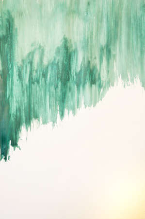 Green watercolor brush stroke, may be used as backgroundの写真素材