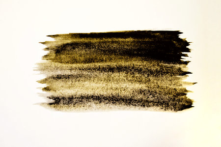Stroke of black mascara, isolated on white macro